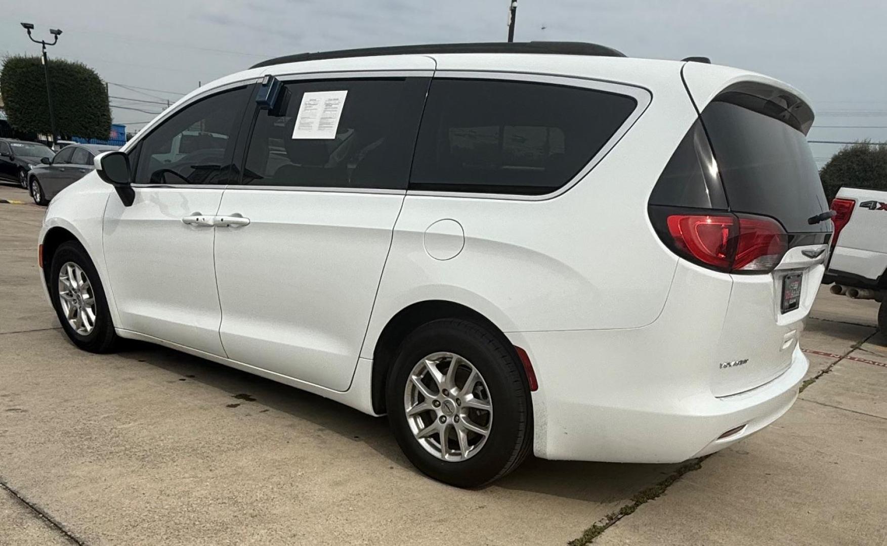 2021 White Chrysler Voyager LXI (2C4RC1DG0MR) with an 3.6L V-6 DOHC engine, located at 2401 E Main St., Grand Prairie, TX, 75050, (972) 262-4440, 32.748981, -96.969643 - Photo#4