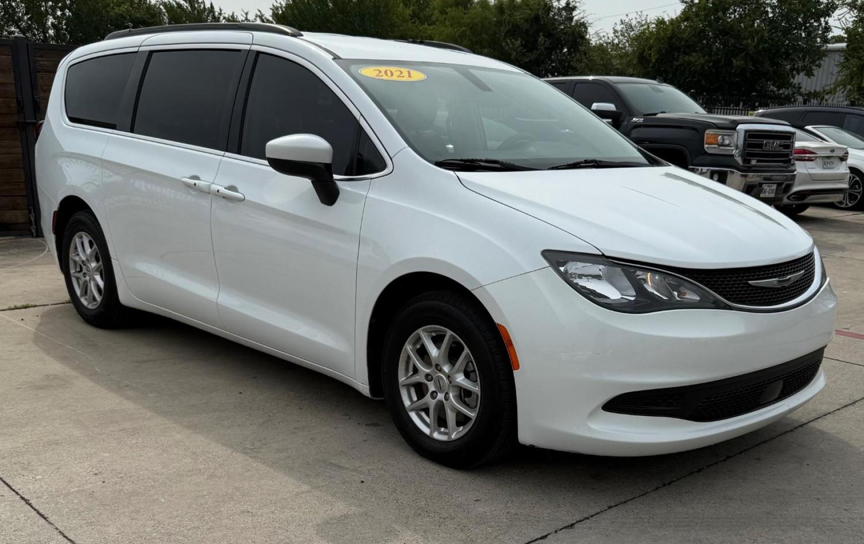 2021 White Chrysler Voyager LXI (2C4RC1DG0MR) with an 3.6L V-6 DOHC engine, located at 2401 E Main St., Grand Prairie, TX, 75050, (972) 262-4440, 32.748981, -96.969643 - Photo#13