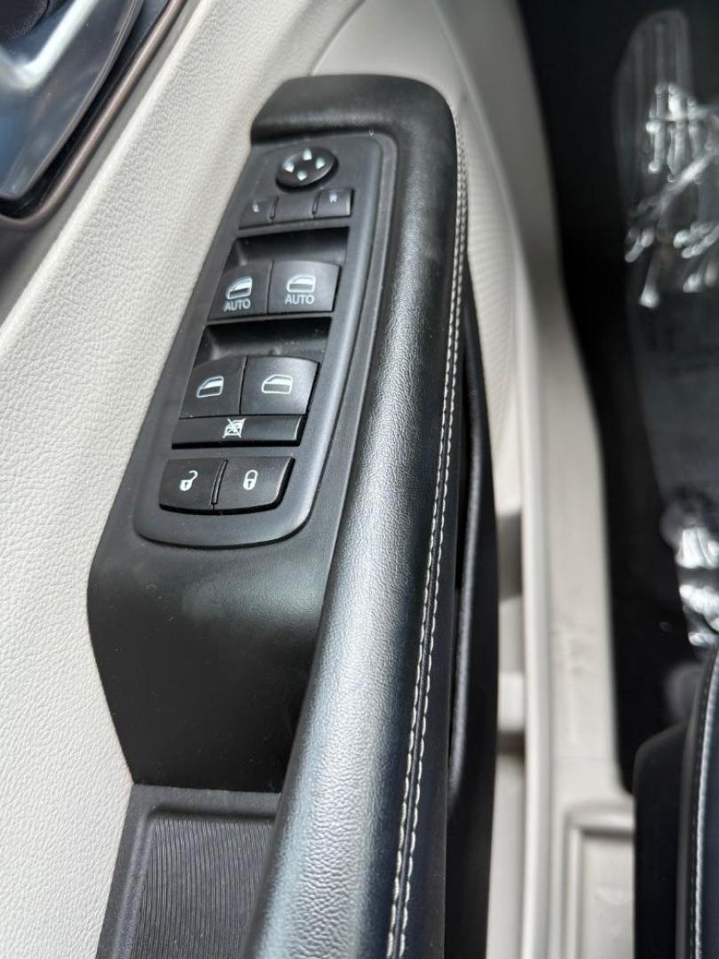 2021 White Chrysler Voyager LXI (2C4RC1DG0MR) with an 3.6L V-6 DOHC engine, located at 2401 E Main St., Grand Prairie, TX, 75050, (972) 262-4440, 32.748981, -96.969643 - Photo#16