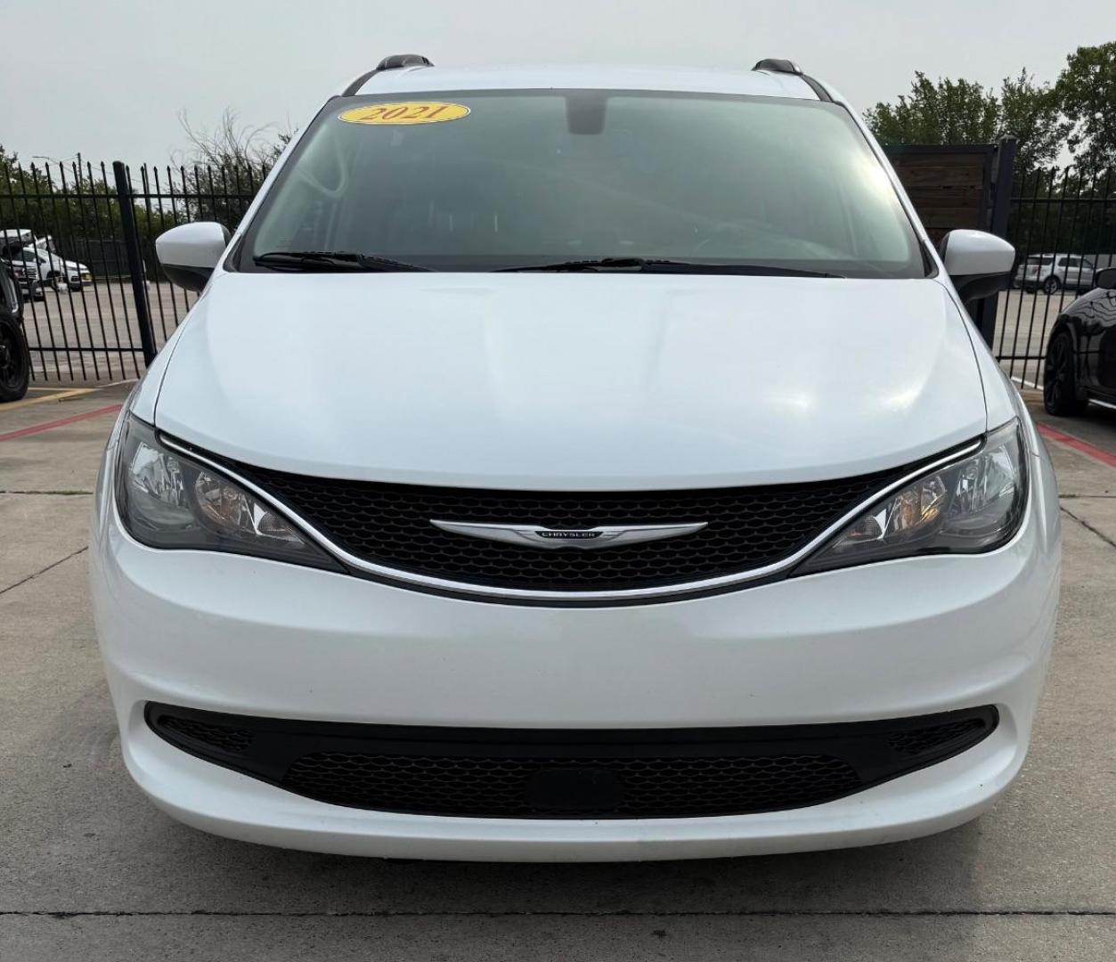 2021 White Chrysler Voyager (2C4RC1DG0MR) with an 3.6L V-6 DOHC engine, located at 2401 E Main St., Grand Prairie, TX, 75050, (972) 262-4440, 32.748981, -96.969643 - Photo#1
