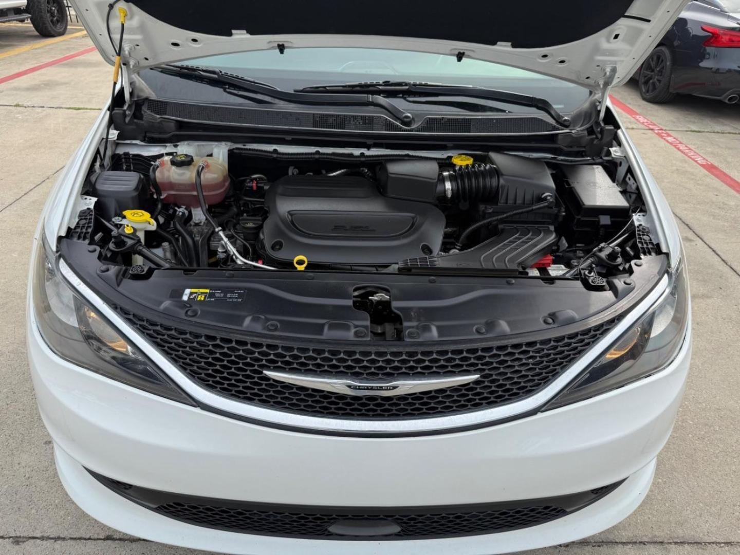 2021 White Chrysler Voyager (2C4RC1DG0MR) with an 3.6L V-6 DOHC engine, located at 2401 E Main St., Grand Prairie, TX, 75050, (972) 262-4440, 32.748981, -96.969643 - Photo#21