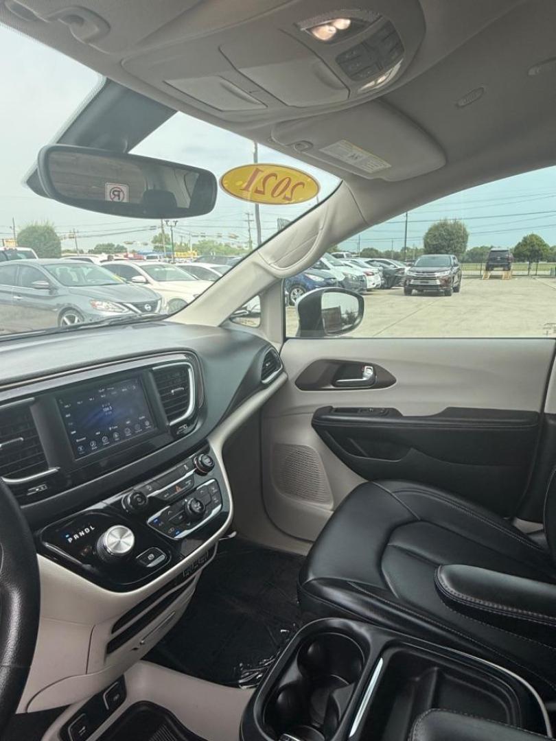2021 White Chrysler Voyager (2C4RC1DG0MR) with an 3.6L V-6 DOHC engine, located at 2401 E Main St., Grand Prairie, TX, 75050, (972) 262-4440, 32.748981, -96.969643 - Photo#23