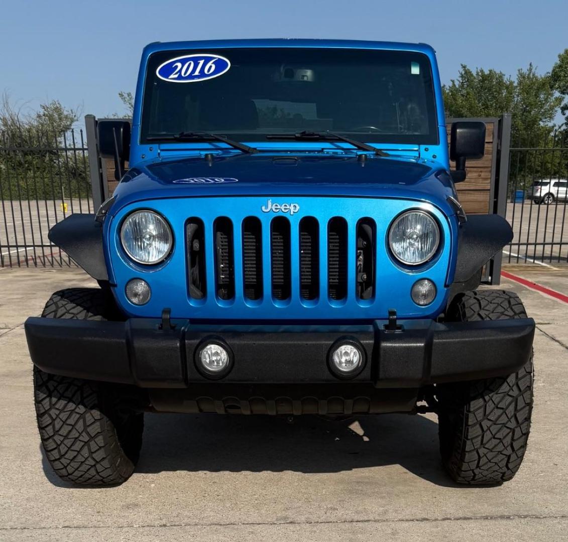 2016 Blue Jeep Wrangler Unlimited Sport (1C4BJWDG3GL) with an Pentastar 3.6L V-6 DOHC engine, located at 2401 E Main St., Grand Prairie, TX, 75050, (972) 262-4440, 32.748981, -96.969643 - Photo#1