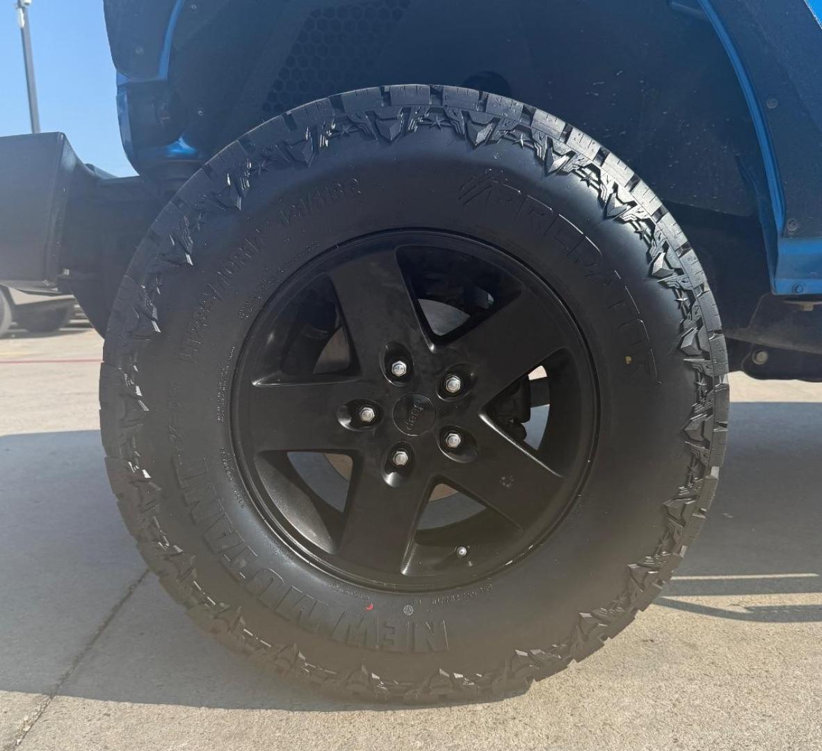 2016 Blue Jeep Wrangler Unlimited Sport (1C4BJWDG3GL) with an Pentastar 3.6L V-6 DOHC engine, located at 2401 E Main St., Grand Prairie, TX, 75050, (972) 262-4440, 32.748981, -96.969643 - Photo#3