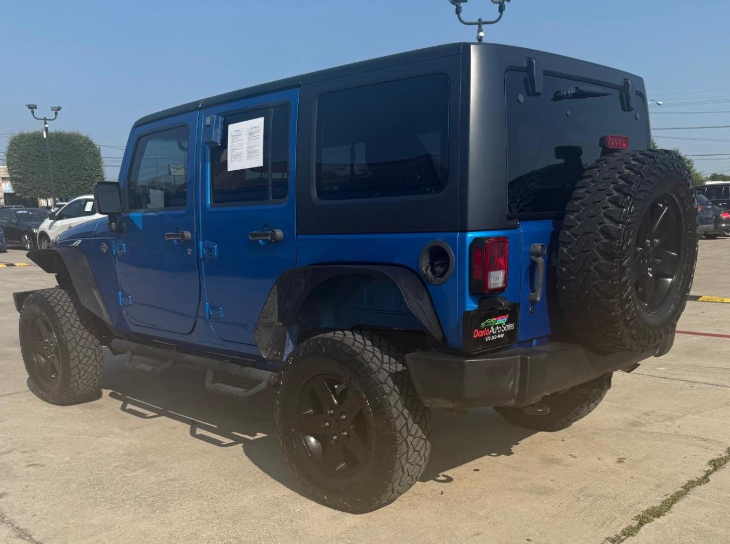 2016 Blue Jeep Wrangler Unlimited Sport (1C4BJWDG3GL) with an Pentastar 3.6L V-6 DOHC engine, located at 2401 E Main St., Grand Prairie, TX, 75050, (972) 262-4440, 32.748981, -96.969643 - Photo#6