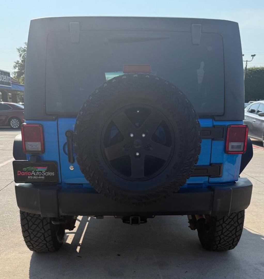 2016 Blue Jeep Wrangler Unlimited Sport (1C4BJWDG3GL) with an Pentastar 3.6L V-6 DOHC engine, located at 2401 E Main St., Grand Prairie, TX, 75050, (972) 262-4440, 32.748981, -96.969643 - Photo#10