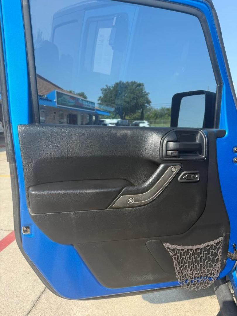 2016 Blue Jeep Wrangler Unlimited Sport (1C4BJWDG3GL) with an Pentastar 3.6L V-6 DOHC engine, located at 2401 E Main St., Grand Prairie, TX, 75050, (972) 262-4440, 32.748981, -96.969643 - Photo#13