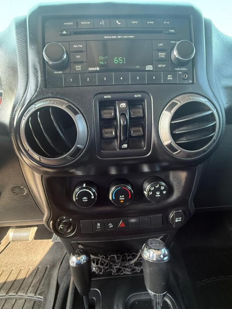 2016 Blue Jeep Wrangler Unlimited Sport (1C4BJWDG3GL) with an Pentastar 3.6L V-6 DOHC engine, located at 2401 E Main St., Grand Prairie, TX, 75050, (972) 262-4440, 32.748981, -96.969643 - Photo#17