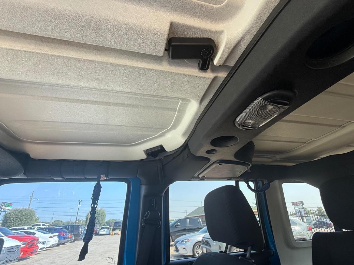 2016 Blue Jeep Wrangler Unlimited Sport (1C4BJWDG3GL) with an Pentastar 3.6L V-6 DOHC engine, located at 2401 E Main St., Grand Prairie, TX, 75050, (972) 262-4440, 32.748981, -96.969643 - Photo#23