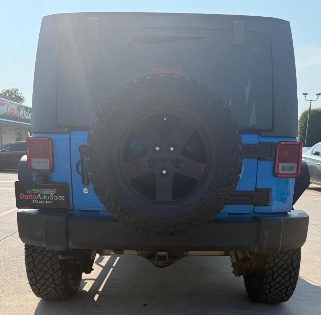 2016 Blue Jeep Wrangler Unlimited Sport (1C4BJWDG3GL) with an Pentastar 3.6L V-6 DOHC engine, located at 2401 E Main St., Grand Prairie, TX, 75050, (972) 262-4440, 32.748981, -96.969643 - Photo#24