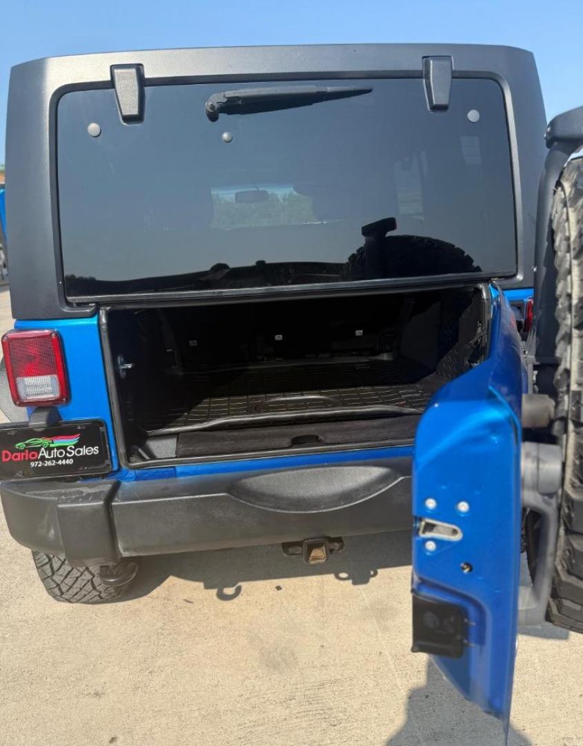 2016 Blue Jeep Wrangler Unlimited Sport (1C4BJWDG3GL) with an Pentastar 3.6L V-6 DOHC engine, located at 2401 E Main St., Grand Prairie, TX, 75050, (972) 262-4440, 32.748981, -96.969643 - Photo#28