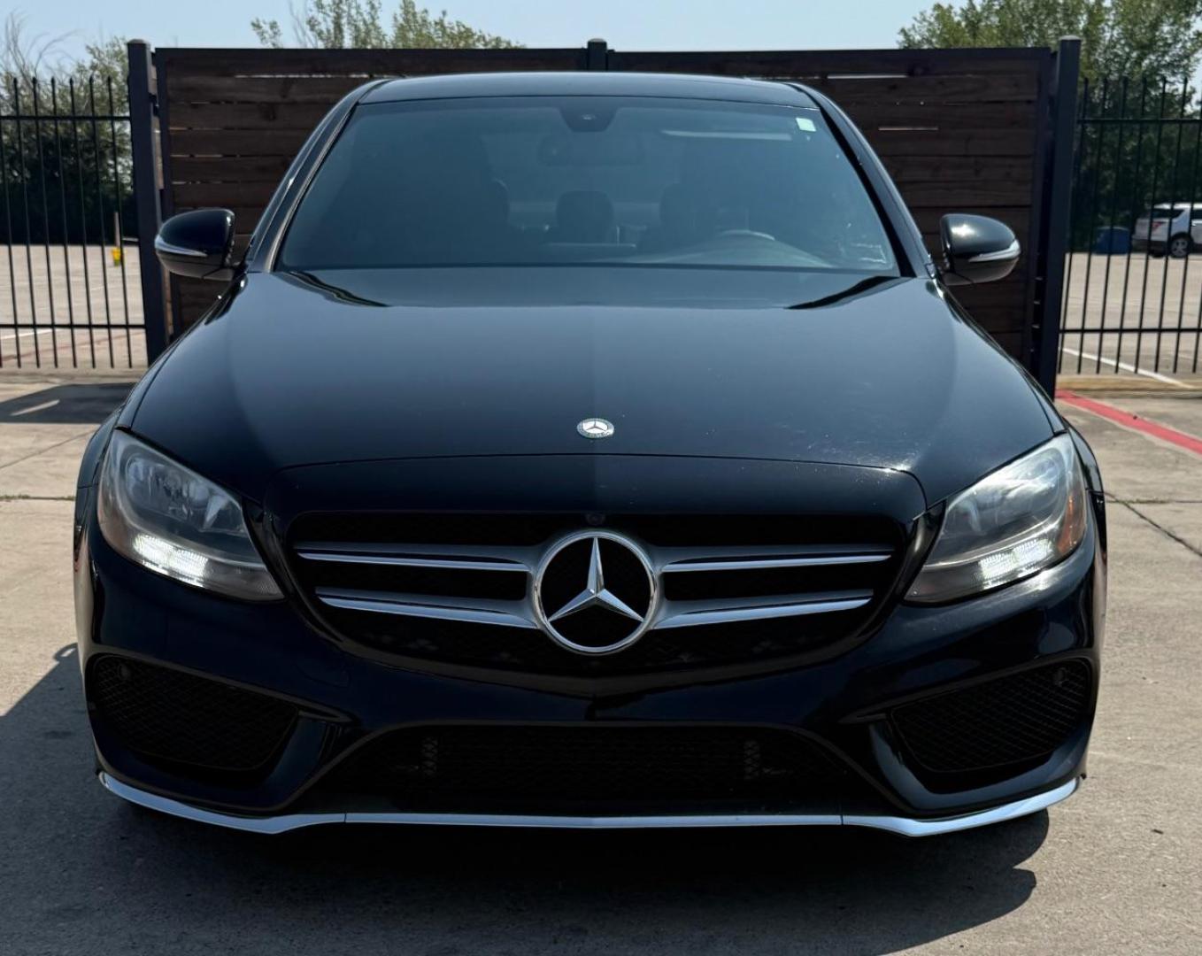 2015 Black Mercedes-Benz C 300 Sport | Luxury (55SWF4JB8FU) with an 2L I-4 gasoline direct injection engine, located at 2401 E Main St., Grand Prairie, TX, 75050, (972) 262-4440, 32.748981, -96.969643 - Photo#0