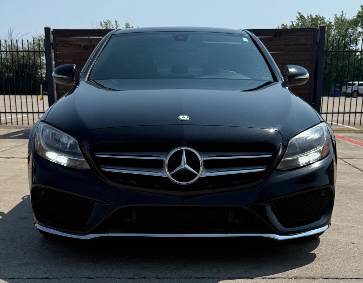 2015 Black Mercedes-Benz C 300 Sport | Luxury (55SWF4JB8FU) with an 2L I-4 gasoline direct injection engine, located at 2401 E Main St., Grand Prairie, TX, 75050, (972) 262-4440, 32.748981, -96.969643 - Photo#1