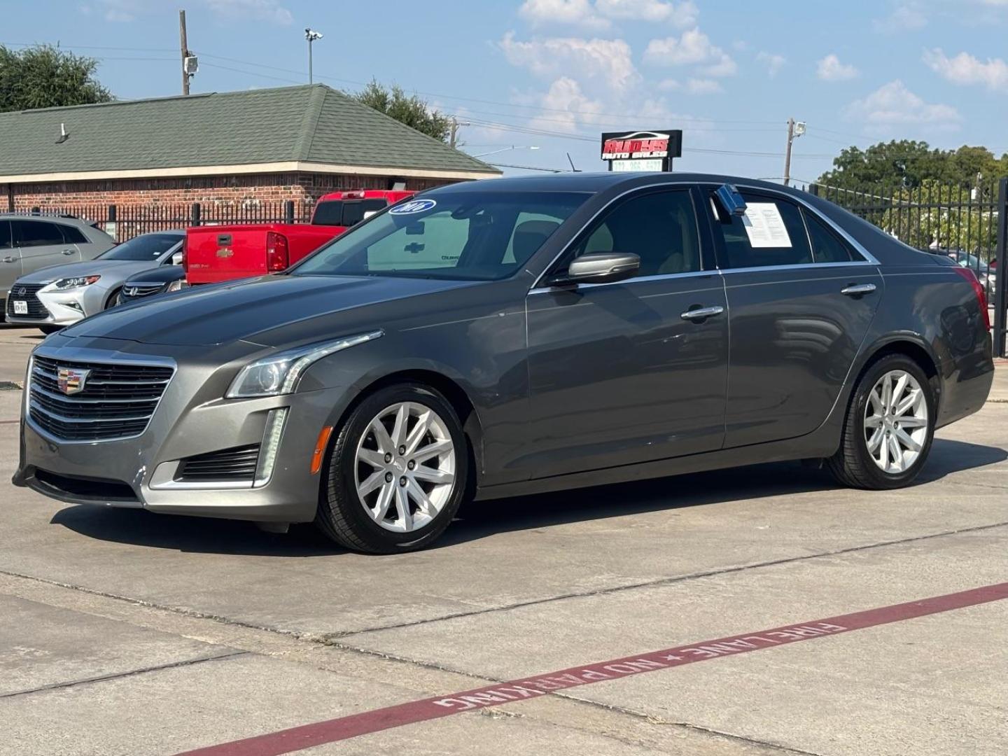 2016 Gray Cadillac CTS Standard (1G6AP5SX5G0) with an 2L I-4 gasoline direct injection engine, located at 2401 E Main St., Grand Prairie, TX, 75050, (972) 262-4440, 32.748981, -96.969643 - Photo#2
