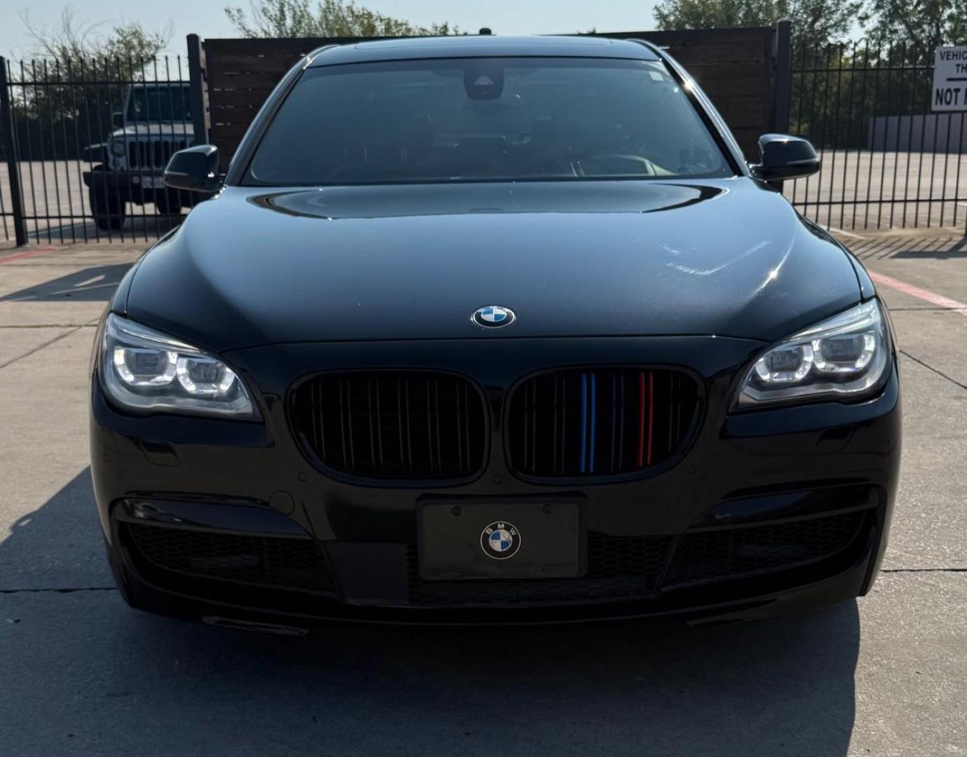 2015 Black BMW 750Li R (WBAYE8C56FD) , located at 2401 E Main St., Grand Prairie, TX, 75050, (972) 262-4440, 32.748981, -96.969643 - Photo#1