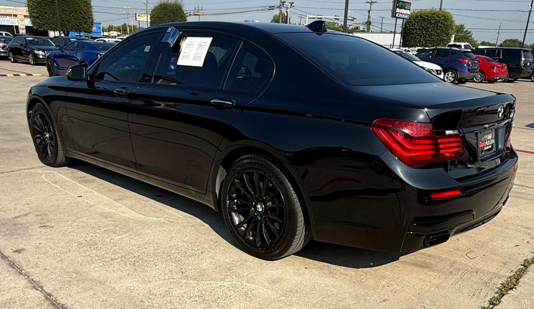 2015 Black BMW 750Li R (WBAYE8C56FD) , located at 2401 E Main St., Grand Prairie, TX, 75050, (972) 262-4440, 32.748981, -96.969643 - Photo#4