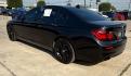 2015 Black BMW 750Li R (WBAYE8C56FD) , located at 2401 E Main St., Grand Prairie, TX, 75050, (972) 262-4440, 32.748981, -96.969643 - Photo#4