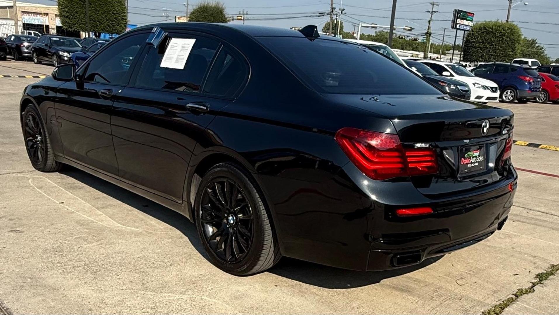 2015 Black BMW 750Li R (WBAYE8C56FD) , located at 2401 E Main St., Grand Prairie, TX, 75050, (972) 262-4440, 32.748981, -96.969643 - Photo#5