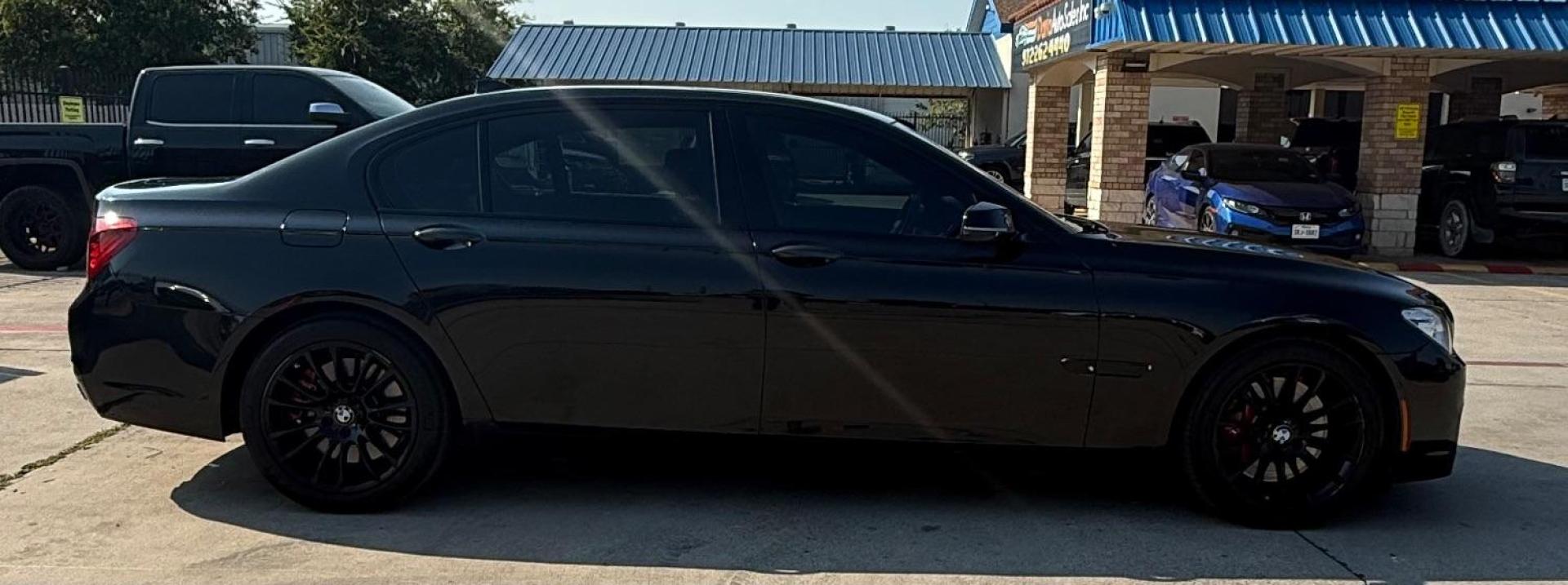 2015 Black BMW 750Li R (WBAYE8C56FD) , located at 2401 E Main St., Grand Prairie, TX, 75050, (972) 262-4440, 32.748981, -96.969643 - Photo#11