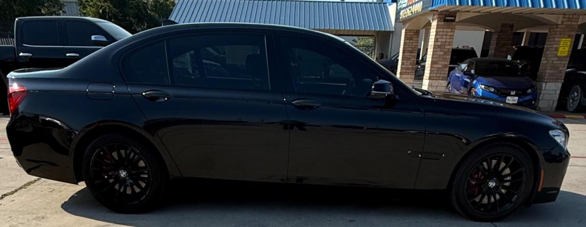 2015 Black BMW 750Li R (WBAYE8C56FD) , located at 2401 E Main St., Grand Prairie, TX, 75050, (972) 262-4440, 32.748981, -96.969643 - Photo#12