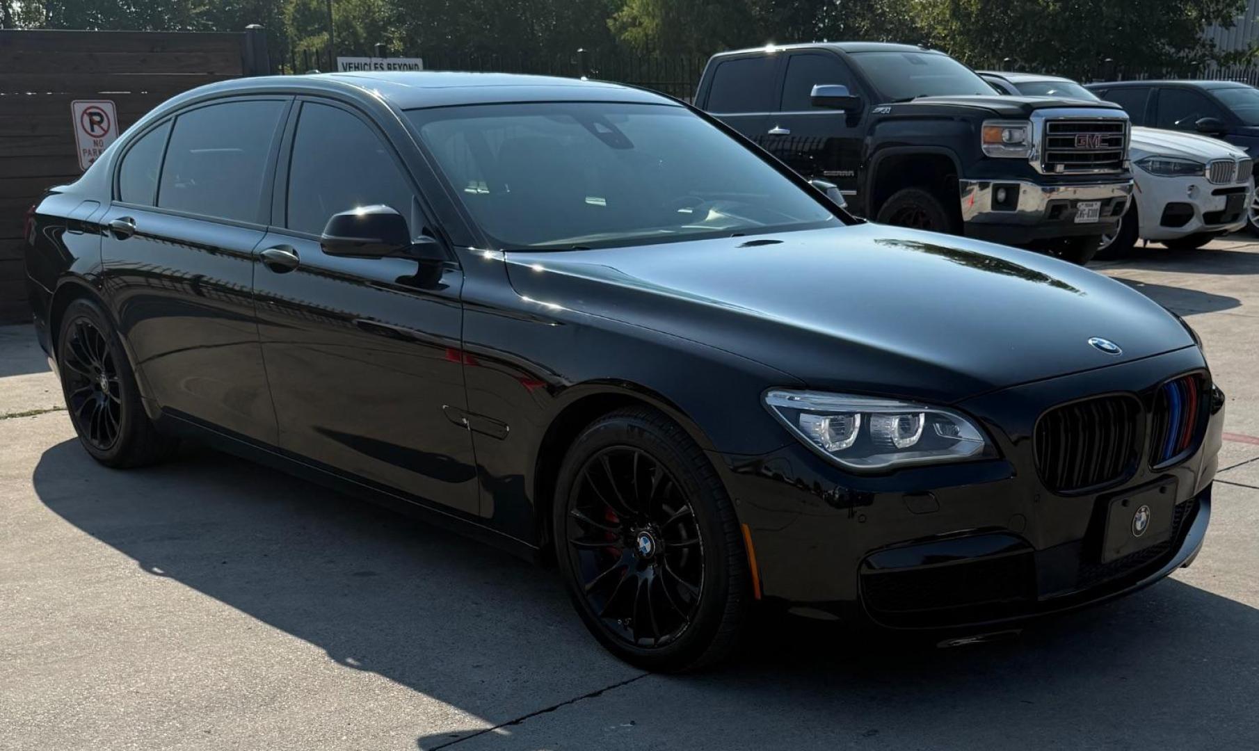 2015 Black BMW 750Li R (WBAYE8C56FD) , located at 2401 E Main St., Grand Prairie, TX, 75050, (972) 262-4440, 32.748981, -96.969643 - Photo#14