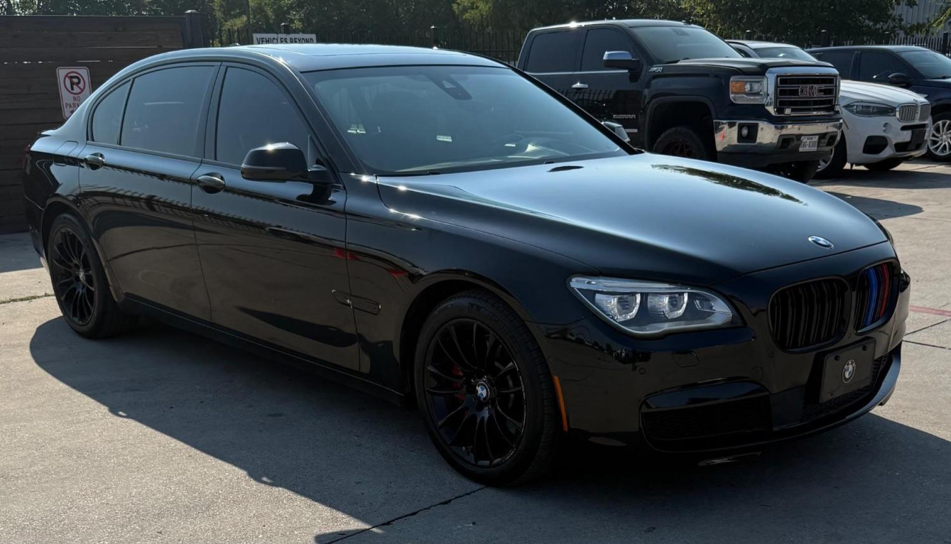 2015 Black BMW 750Li R (WBAYE8C56FD) , located at 2401 E Main St., Grand Prairie, TX, 75050, (972) 262-4440, 32.748981, -96.969643 - Photo#15