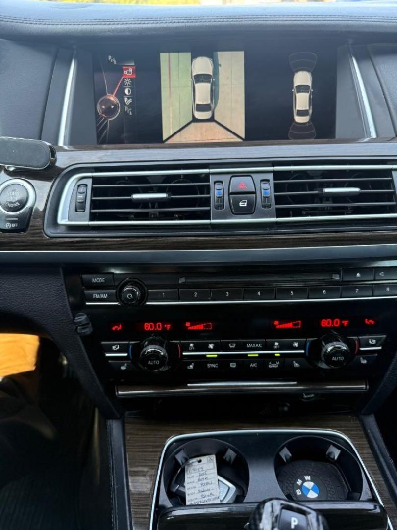 2015 Black BMW 750Li R (WBAYE8C56FD) , located at 2401 E Main St., Grand Prairie, TX, 75050, (972) 262-4440, 32.748981, -96.969643 - Photo#27