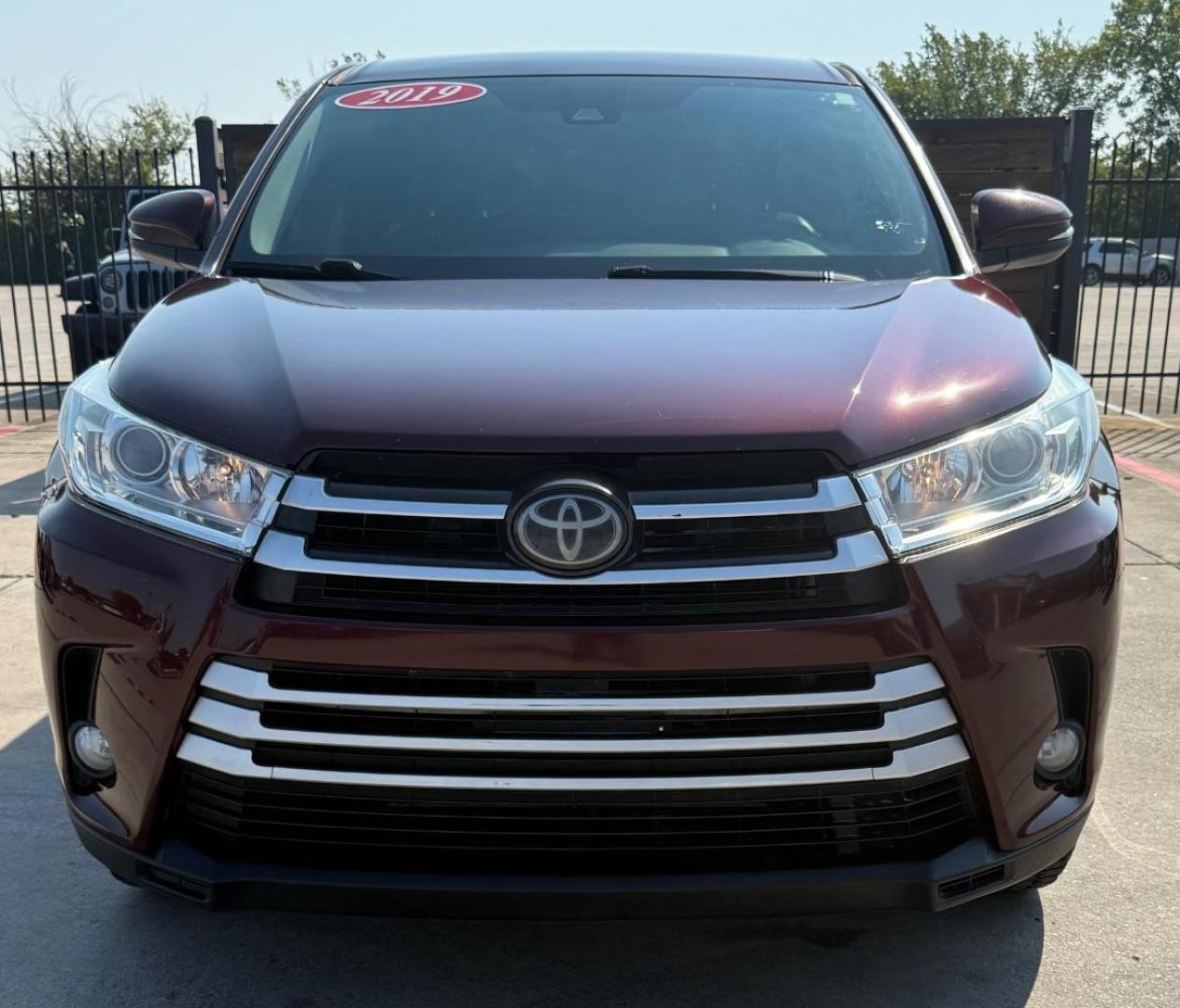 2019 Red Toyota Highlander LE (5TDZZRFHXKS) with an 3.5L V-6 port/direct injection engine, located at 2401 E Main St., Grand Prairie, TX, 75050, (972) 262-4440, 32.748981, -96.969643 - Photo#1