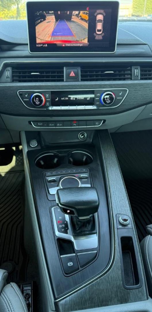 2018 Red Audi A5 2.0T Premium (WAUTNAF56JA) with an 2L I-4 gasoline direct injection engine, located at 2401 E Main St., Grand Prairie, TX, 75050, (972) 262-4440, 32.748981, -96.969643 - Photo#24