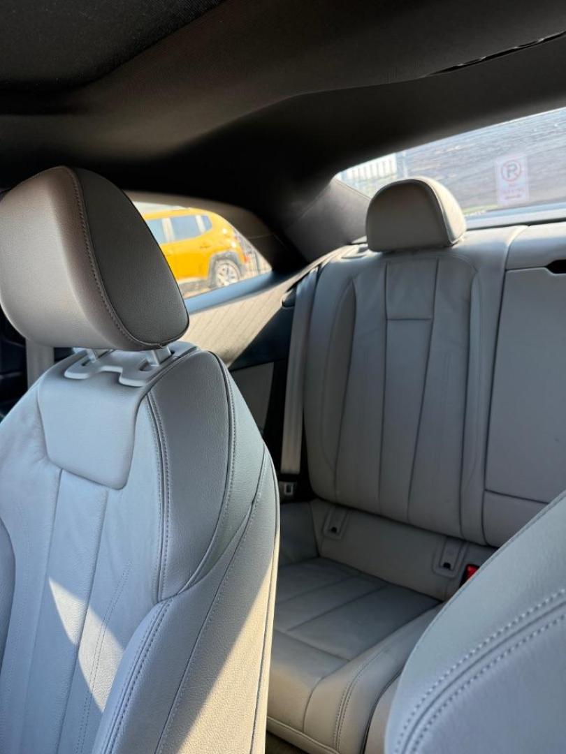 2018 Red Audi A5 2.0T Premium (WAUTNAF56JA) with an 2L I-4 gasoline direct injection engine, located at 2401 E Main St., Grand Prairie, TX, 75050, (972) 262-4440, 32.748981, -96.969643 - Photo#31