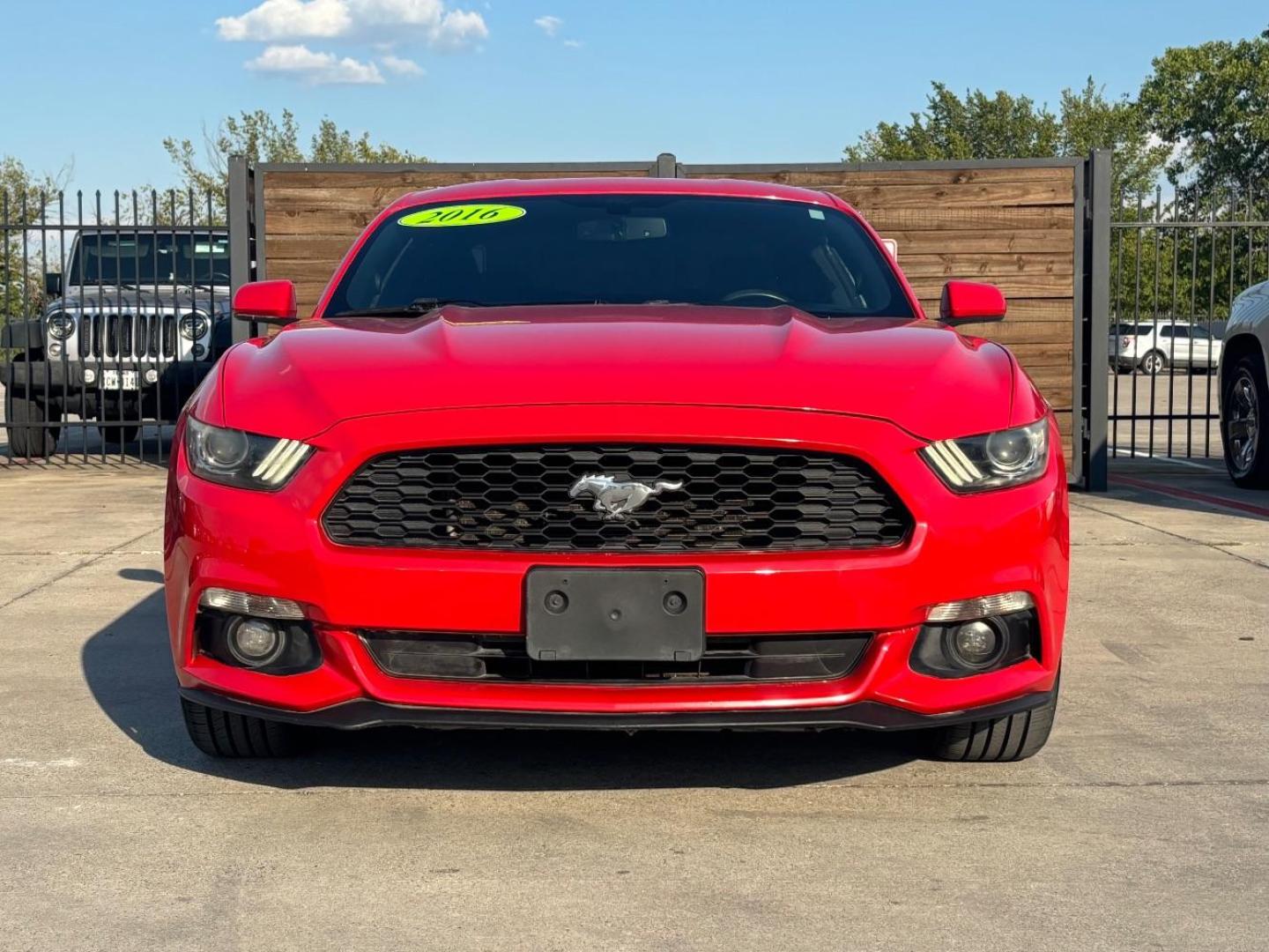 2016 Red Ford Mustang V6 (1FA6P8AM0G5) with an 3.7L V-6 DOHC engine, located at 2401 E Main St., Grand Prairie, TX, 75050, (972) 262-4440, 32.748981, -96.969643 - Photo#0