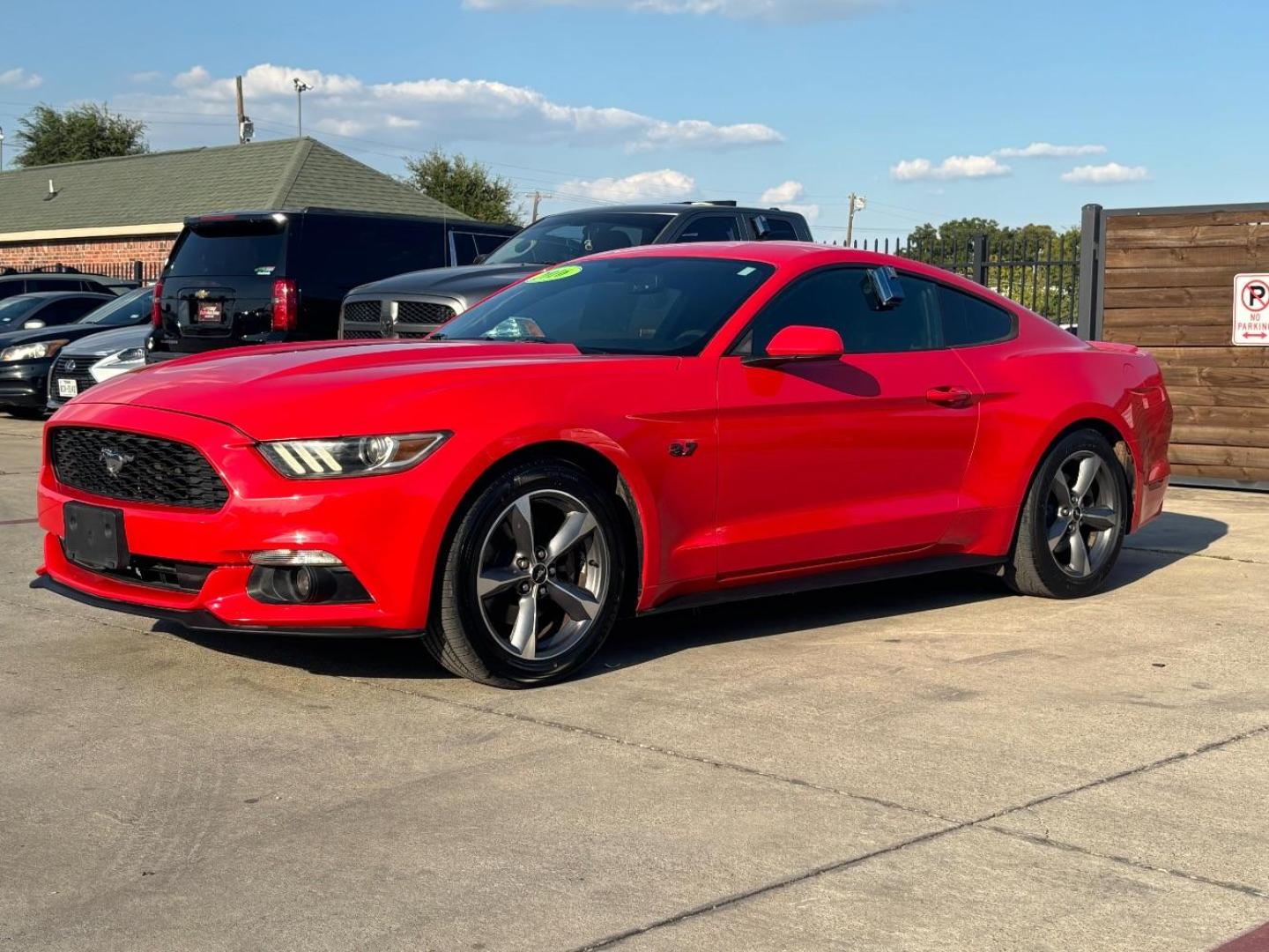 2016 Red Ford Mustang V6 (1FA6P8AM0G5) with an 3.7L V-6 DOHC engine, located at 2401 E Main St., Grand Prairie, TX, 75050, (972) 262-4440, 32.748981, -96.969643 - Photo#1