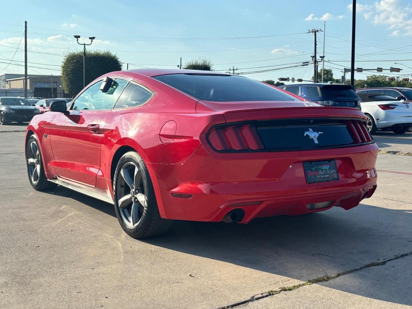 2016 Red Ford Mustang V6 (1FA6P8AM0G5) with an 3.7L V-6 DOHC engine, located at 2401 E Main St., Grand Prairie, TX, 75050, (972) 262-4440, 32.748981, -96.969643 - Photo#5