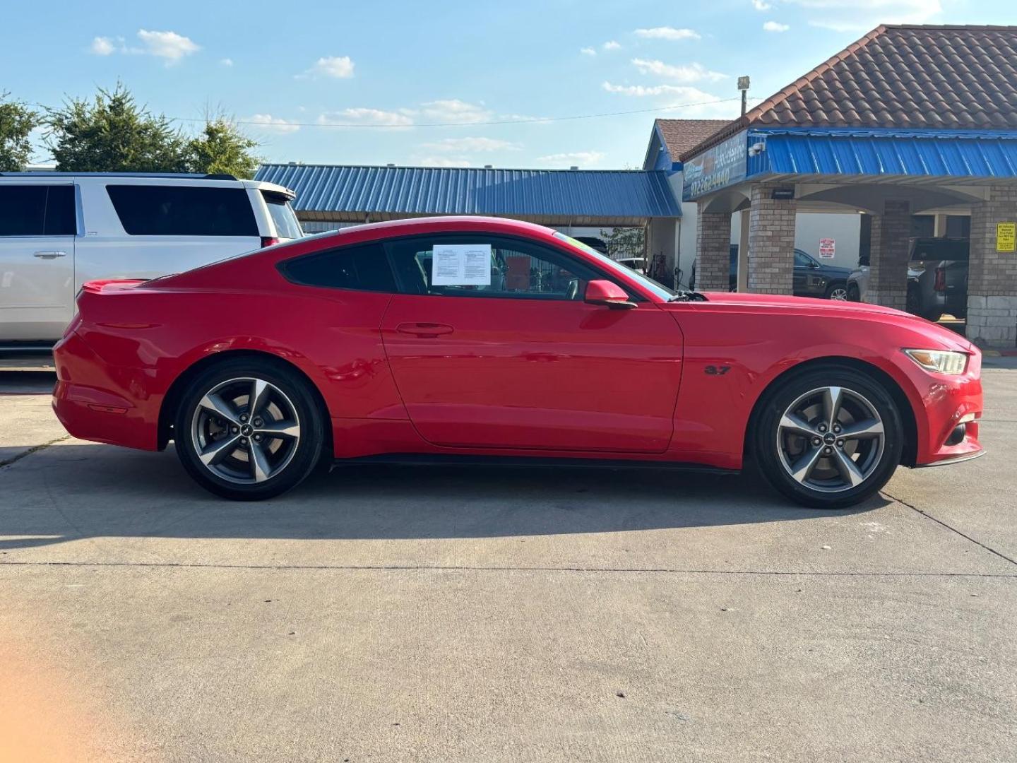 2016 Red Ford Mustang V6 (1FA6P8AM0G5) with an 3.7L V-6 DOHC engine, located at 2401 E Main St., Grand Prairie, TX, 75050, (972) 262-4440, 32.748981, -96.969643 - Photo#8