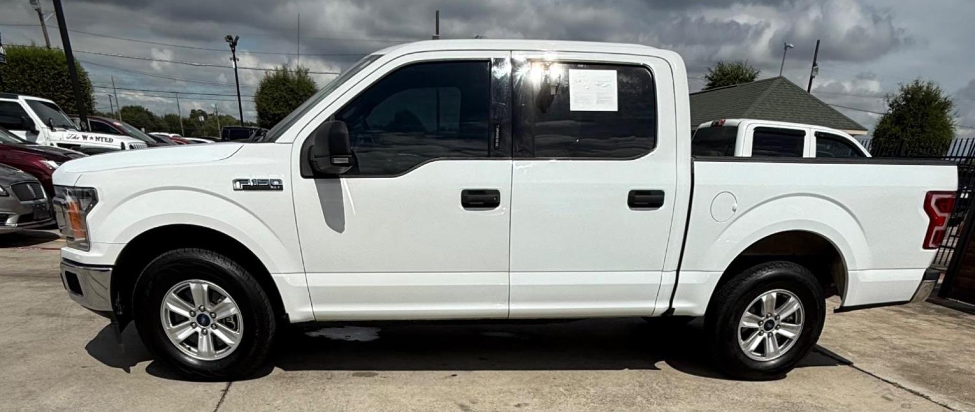 2019 White Ford F-150 XLT (1FTEW1C50KF) , located at 2401 E Main St., Grand Prairie, TX, 75050, (972) 262-4440, 32.748981, -96.969643 - Photo#5