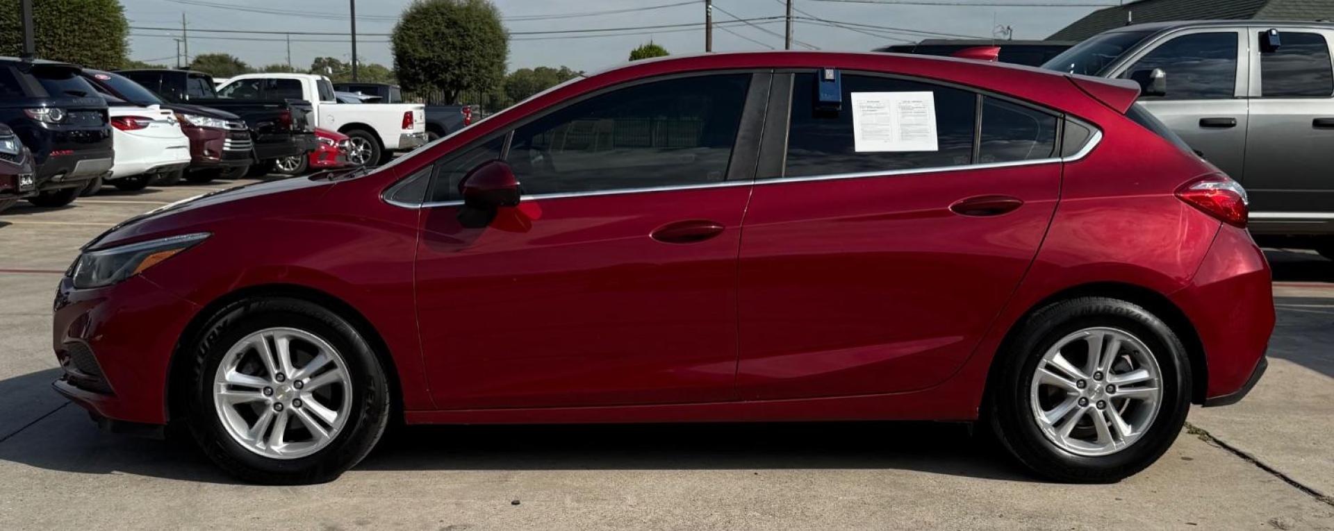2017 Red Chevrolet Cruze LT Auto (3G1BE6SM3HS) with an 1.4L I-4 gasoline direct injection engine, located at 2401 E Main St., Grand Prairie, TX, 75050, (972) 262-4440, 32.748981, -96.969643 - Photo#4