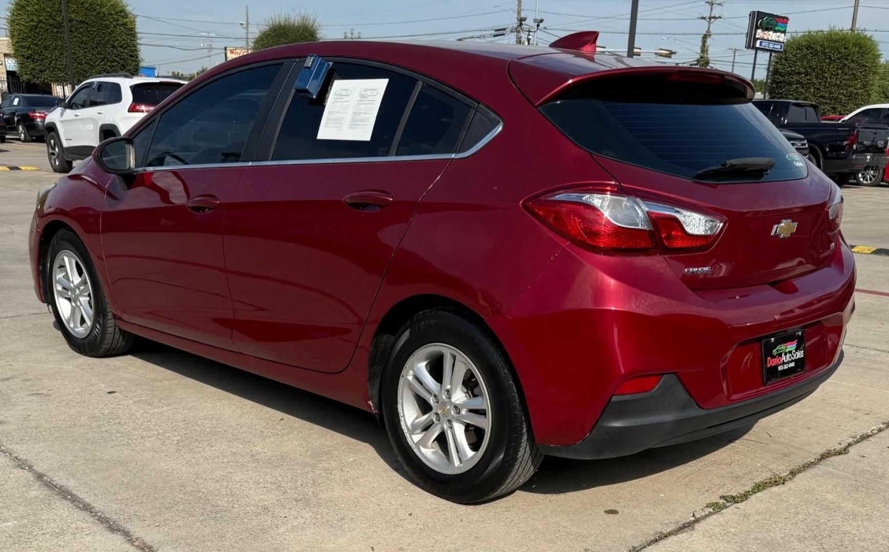 2017 Red Chevrolet Cruze LT Auto (3G1BE6SM3HS) with an 1.4L I-4 gasoline direct injection engine, located at 2401 E Main St., Grand Prairie, TX, 75050, (972) 262-4440, 32.748981, -96.969643 - Photo#5
