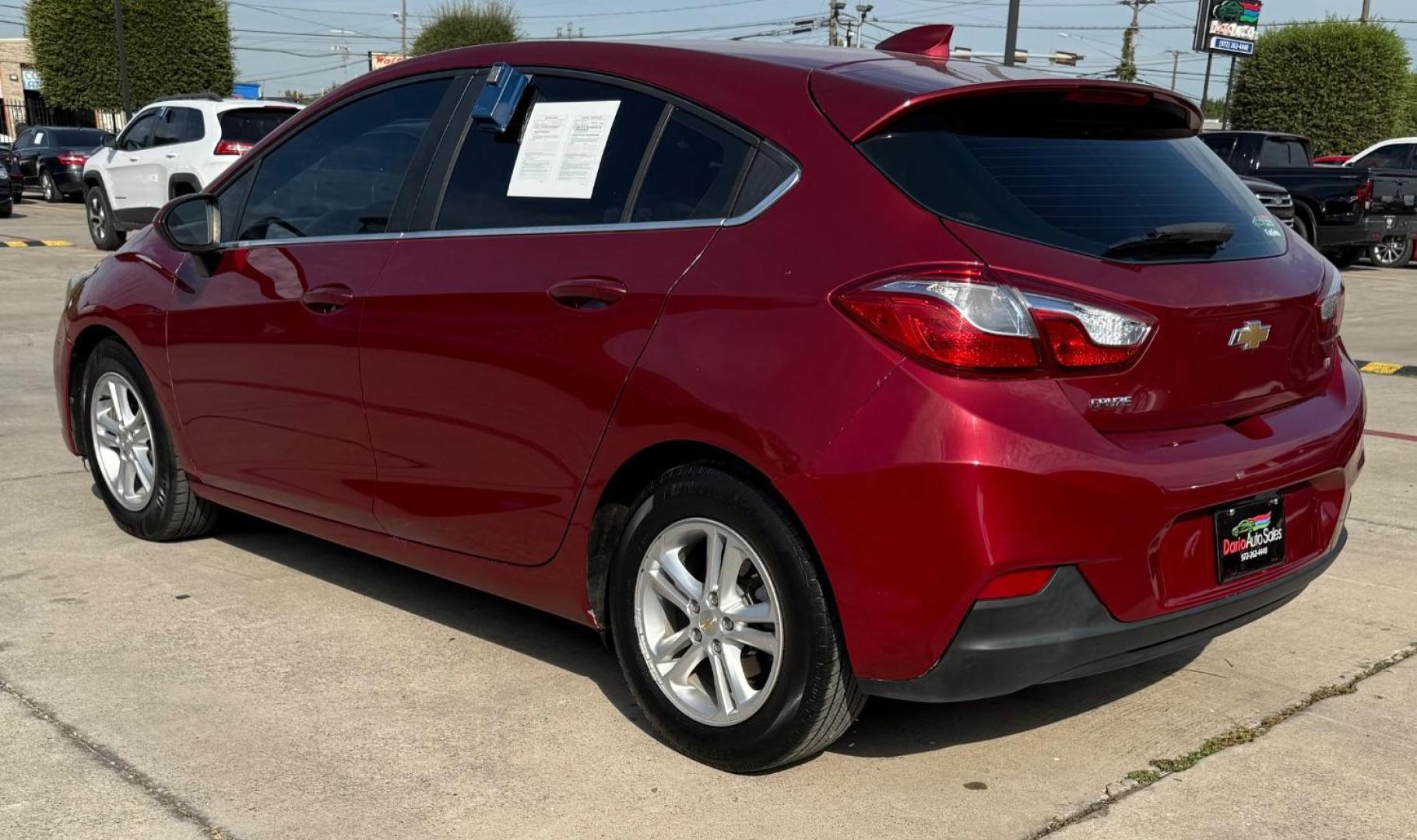 2017 Red Chevrolet Cruze LT Auto (3G1BE6SM3HS) with an 1.4L I-4 gasoline direct injection engine, located at 2401 E Main St., Grand Prairie, TX, 75050, (972) 262-4440, 32.748981, -96.969643 - Photo#6