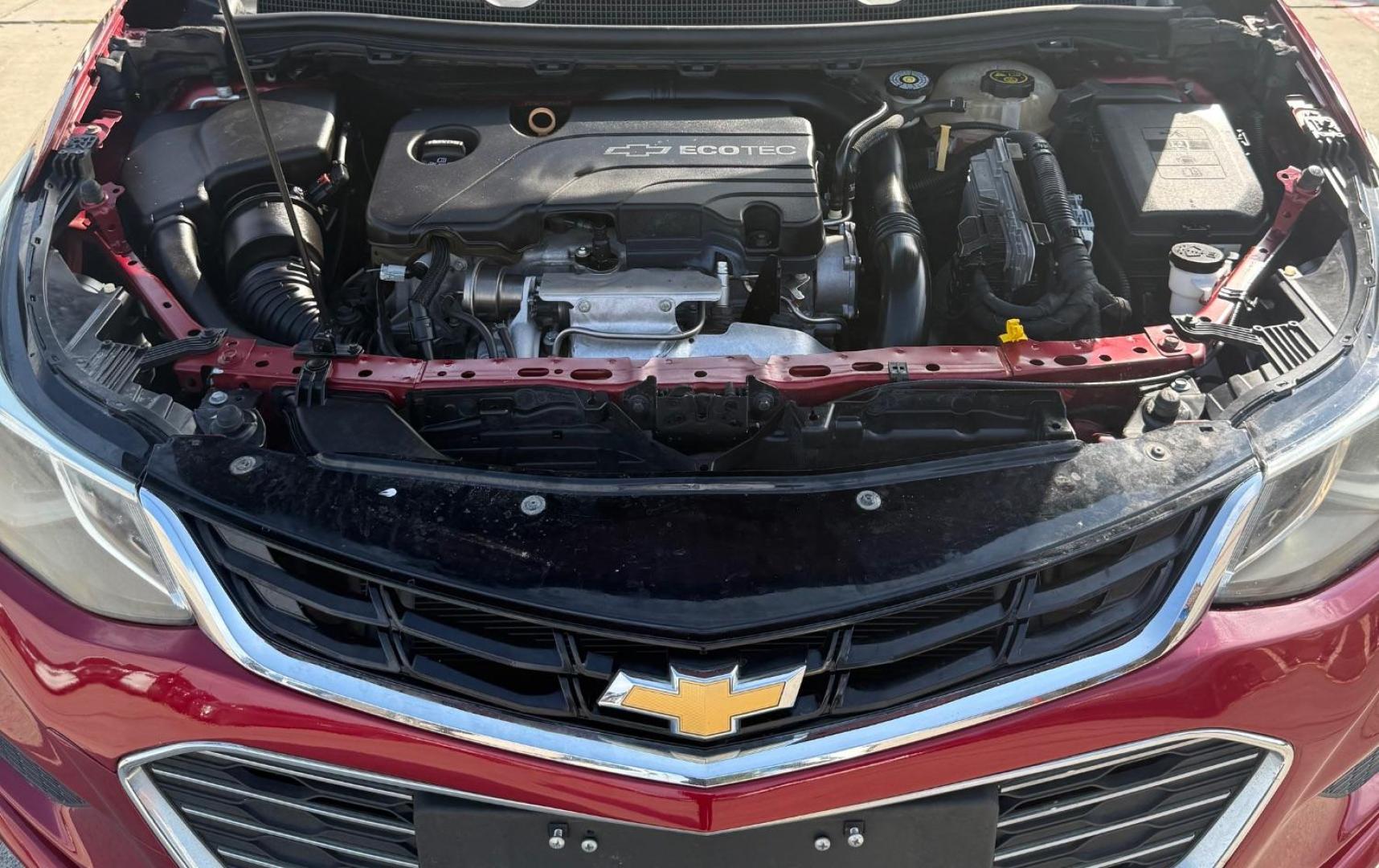 2017 Red Chevrolet Cruze LT Auto (3G1BE6SM3HS) with an 1.4L I-4 gasoline direct injection engine, located at 2401 E Main St., Grand Prairie, TX, 75050, (972) 262-4440, 32.748981, -96.969643 - Photo#28
