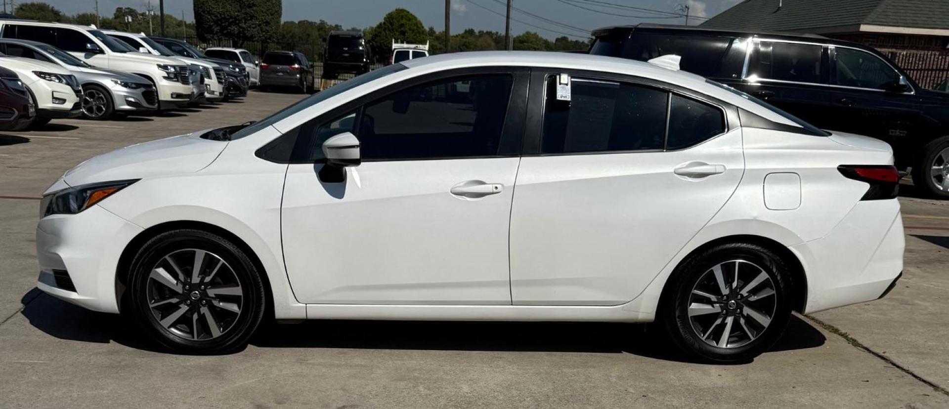 2021 WHITE Nissan Versa SV Xtronic CVT (3N1CN8EV7ML) with an 1.6L I-4 DOHC engine, located at 2401 E Main St., Grand Prairie, TX, 75050, (972) 262-4440, 32.748981, -96.969643 - Photo#4