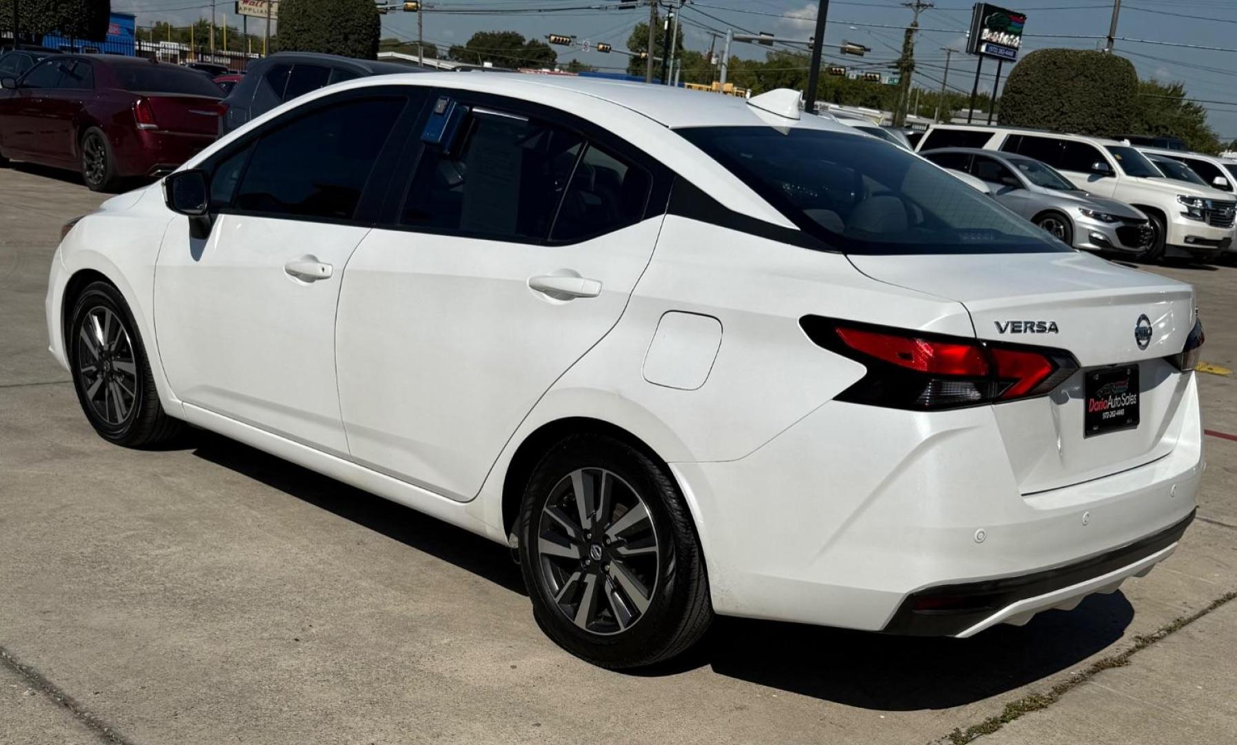 2021 WHITE Nissan Versa SV Xtronic CVT (3N1CN8EV7ML) with an 1.6L I-4 DOHC engine, located at 2401 E Main St., Grand Prairie, TX, 75050, (972) 262-4440, 32.748981, -96.969643 - Photo#6
