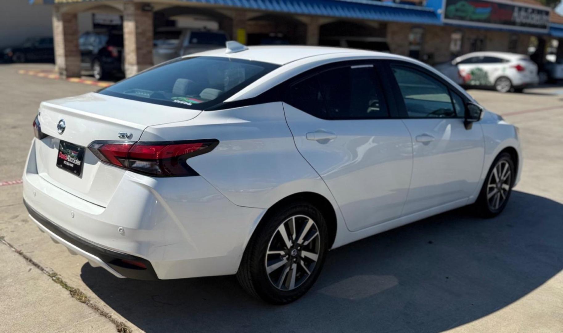 2021 WHITE Nissan Versa SV Xtronic CVT (3N1CN8EV7ML) with an 1.6L I-4 DOHC engine, located at 2401 E Main St., Grand Prairie, TX, 75050, (972) 262-4440, 32.748981, -96.969643 - Photo#12