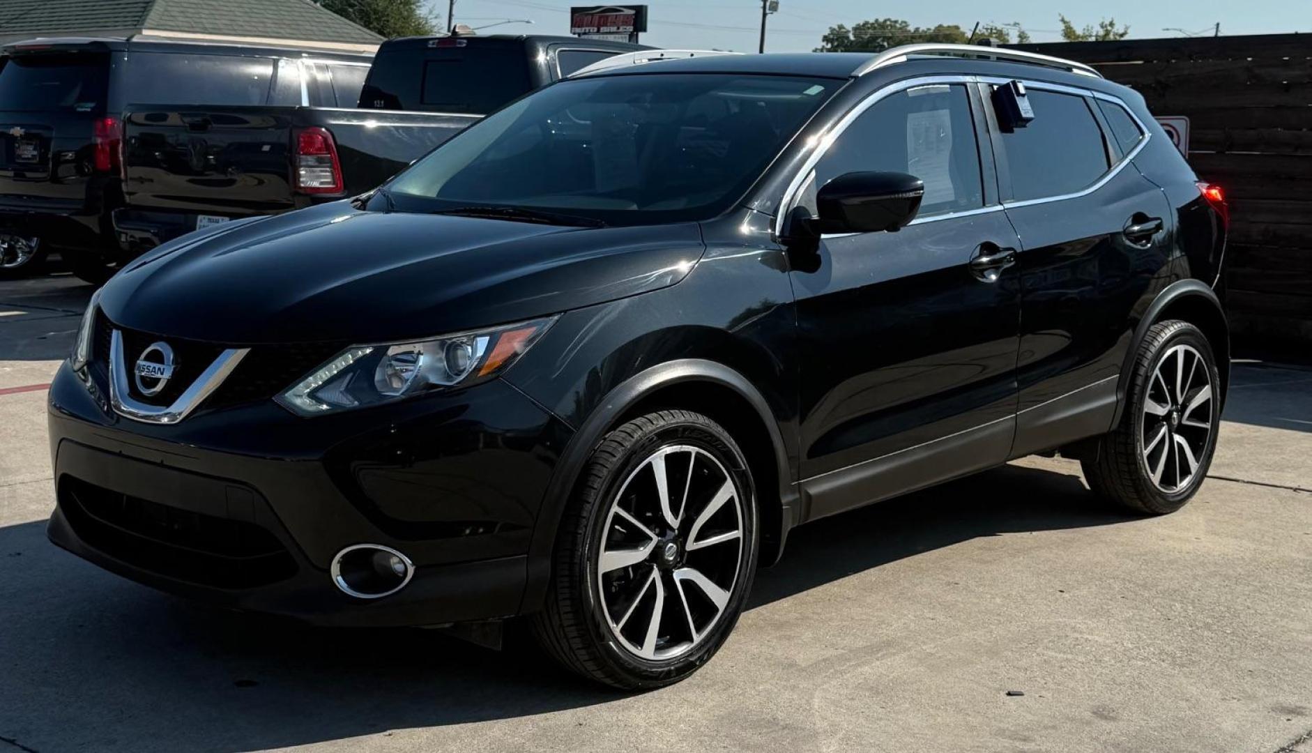 2018 Black Nissan Rogue Sport SL (JN1BJ1CP9JW) with an 2L I-4 gasoline direct injection engine, located at 2401 E Main St., Grand Prairie, TX, 75050, (972) 262-4440, 32.748981, -96.969643 - Photo#2