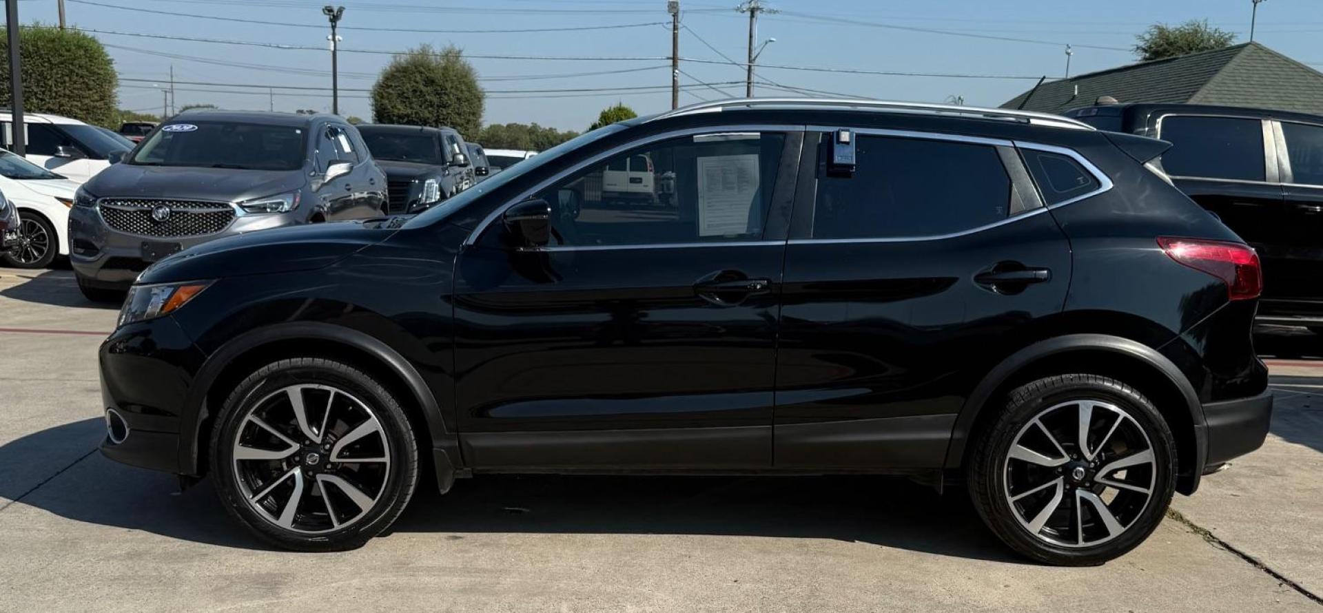 2018 Black Nissan Rogue Sport SL (JN1BJ1CP9JW) with an 2L I-4 gasoline direct injection engine, located at 2401 E Main St., Grand Prairie, TX, 75050, (972) 262-4440, 32.748981, -96.969643 - Photo#5