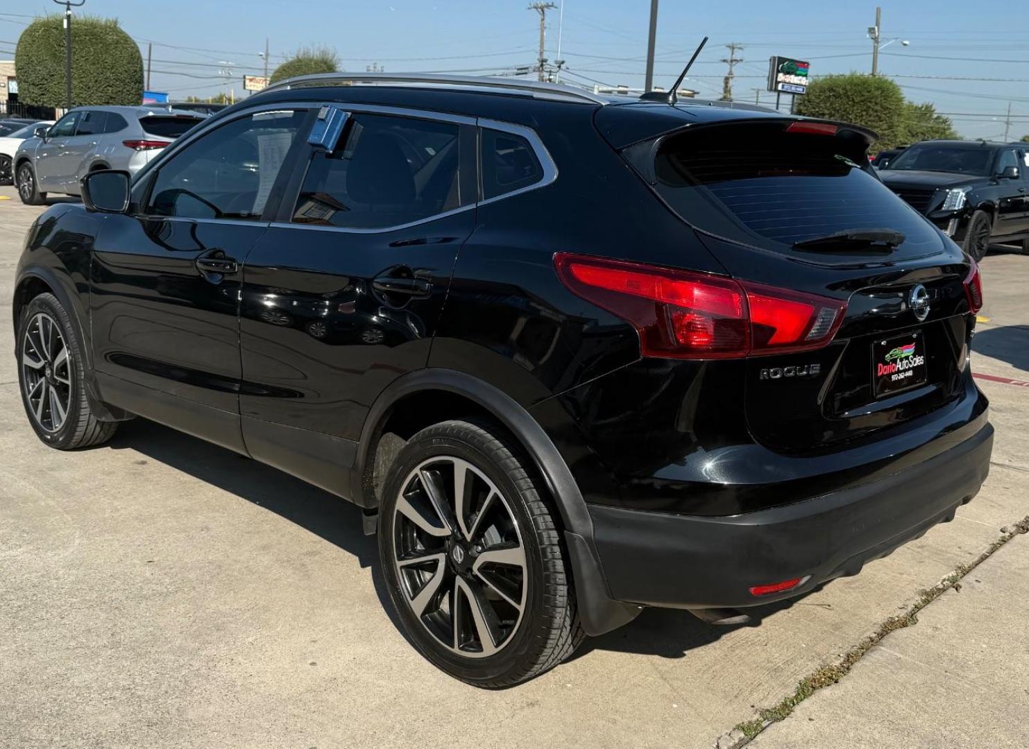 2018 Black Nissan Rogue Sport SL (JN1BJ1CP9JW) with an 2L I-4 gasoline direct injection engine, located at 2401 E Main St., Grand Prairie, TX, 75050, (972) 262-4440, 32.748981, -96.969643 - Photo#6