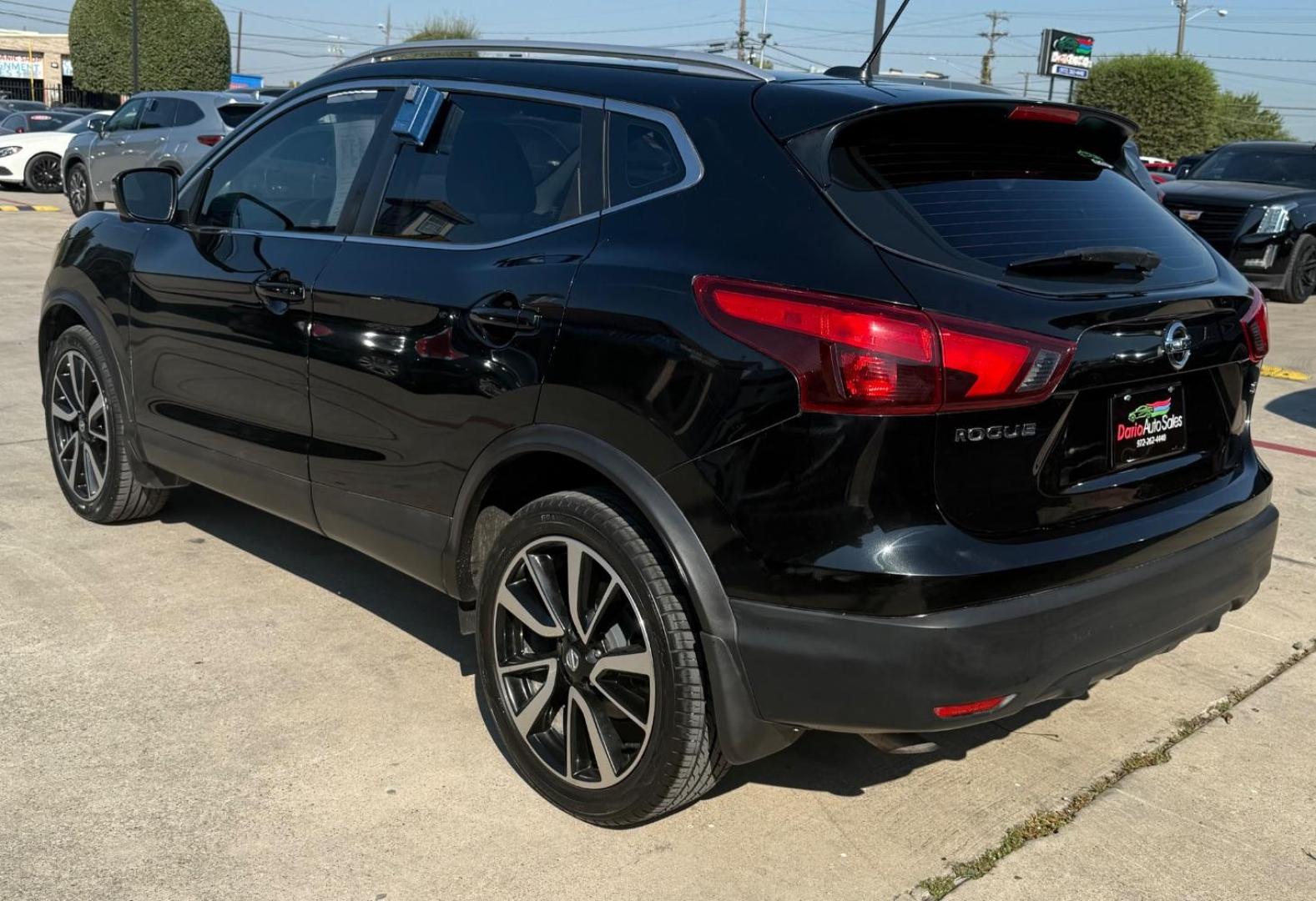 2018 Black Nissan Rogue Sport SL (JN1BJ1CP9JW) with an 2L I-4 gasoline direct injection engine, located at 2401 E Main St., Grand Prairie, TX, 75050, (972) 262-4440, 32.748981, -96.969643 - Photo#7