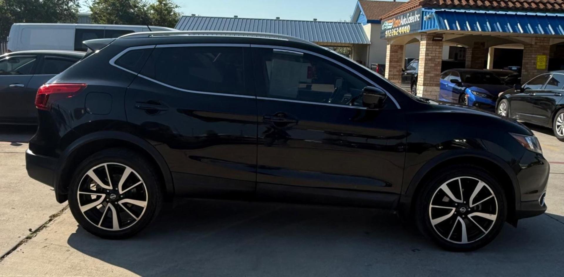 2018 Black Nissan Rogue Sport SL (JN1BJ1CP9JW) with an 2L I-4 gasoline direct injection engine, located at 2401 E Main St., Grand Prairie, TX, 75050, (972) 262-4440, 32.748981, -96.969643 - Photo#15