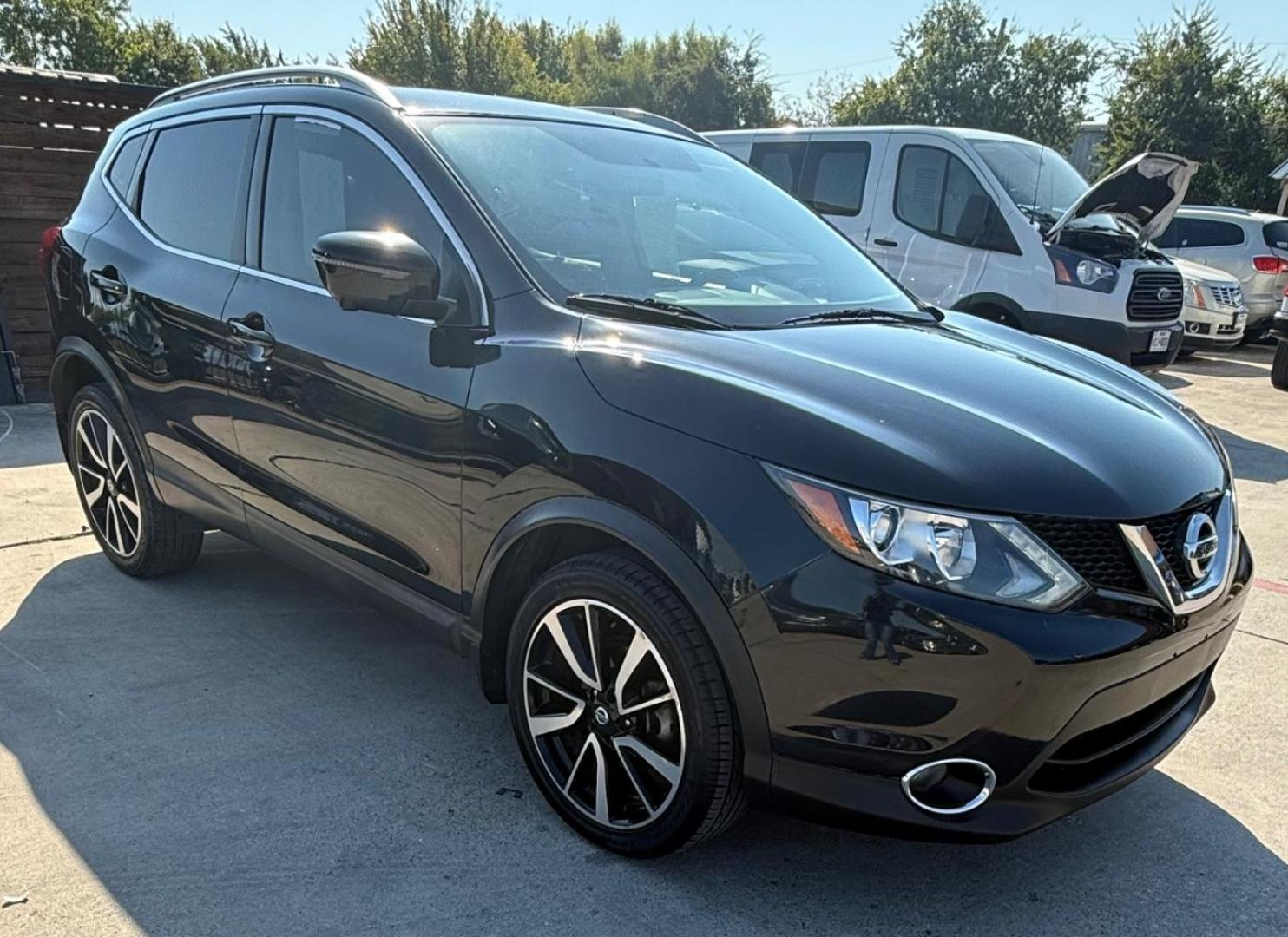 2018 Black Nissan Rogue Sport SL (JN1BJ1CP9JW) with an 2L I-4 gasoline direct injection engine, located at 2401 E Main St., Grand Prairie, TX, 75050, (972) 262-4440, 32.748981, -96.969643 - Photo#18