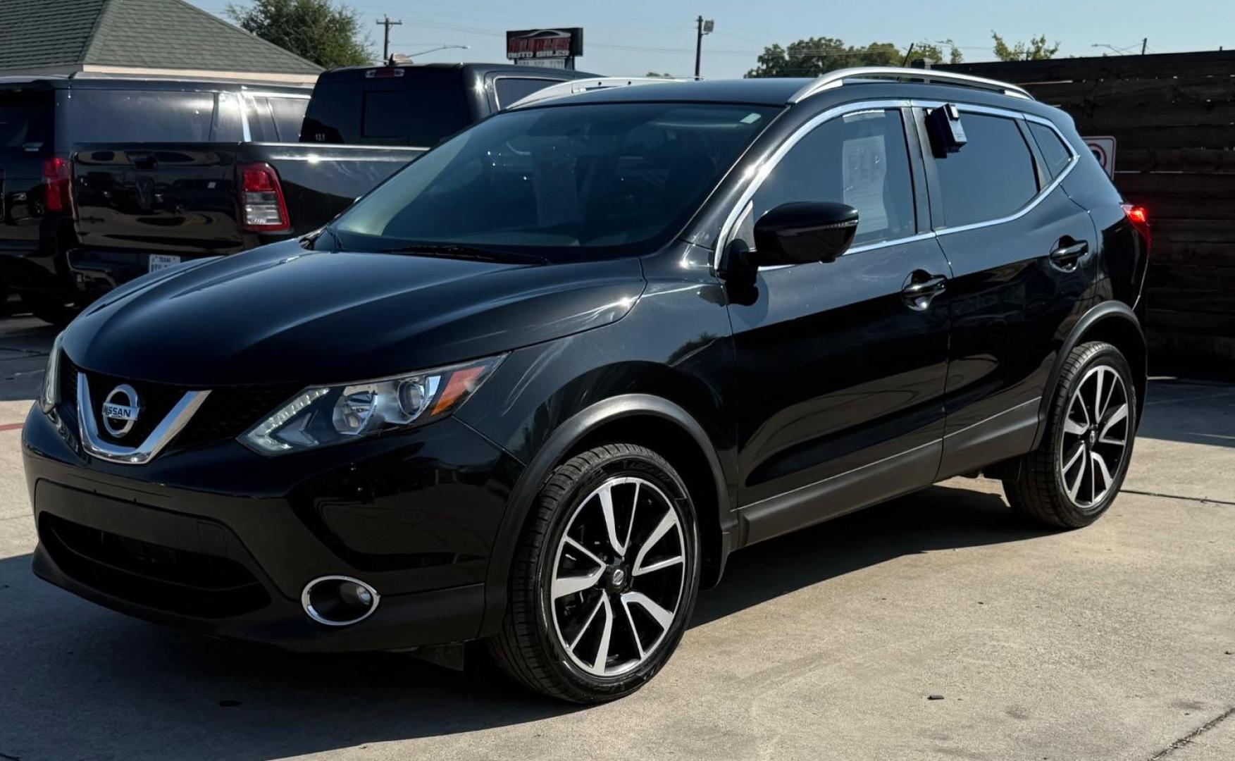 2018 Black Nissan Rogue Sport SL (JN1BJ1CP9JW) with an 2L I-4 gasoline direct injection engine, located at 2401 E Main St., Grand Prairie, TX, 75050, (972) 262-4440, 32.748981, -96.969643 - Photo#33