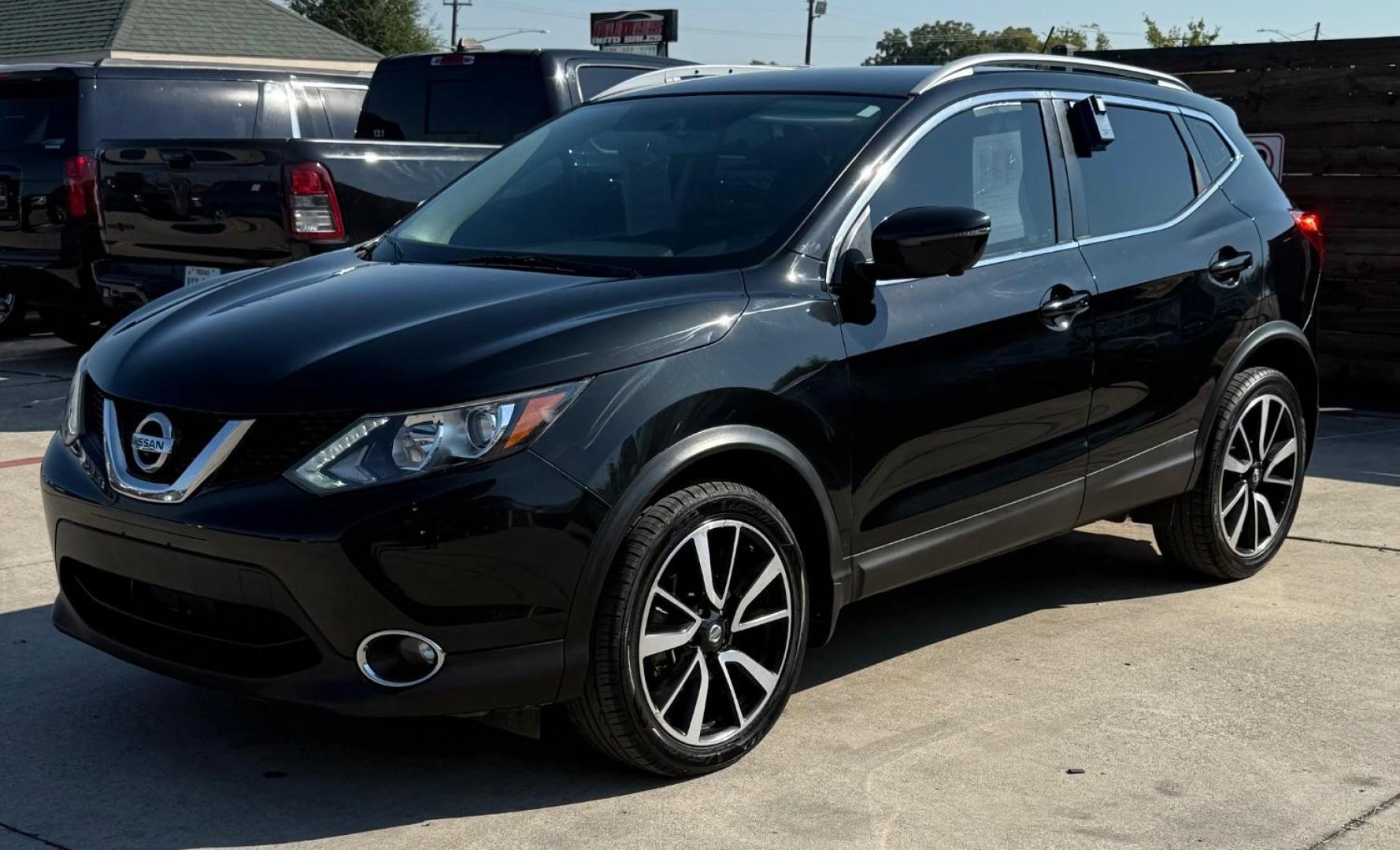 2018 Black Nissan Rogue Sport SL (JN1BJ1CP9JW) with an 2L I-4 gasoline direct injection engine, located at 2401 E Main St., Grand Prairie, TX, 75050, (972) 262-4440, 32.748981, -96.969643 - Photo#34